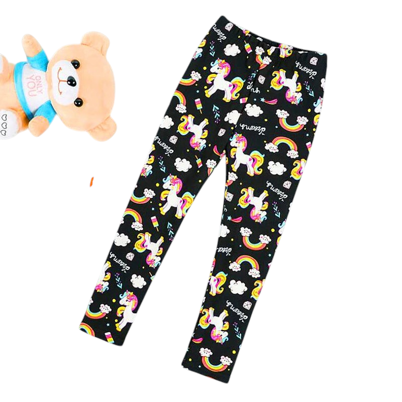 Kcoral Kids black winter leggings for girls featuring a colorful unicorn, rainbow, and cloud cartoon print pattern